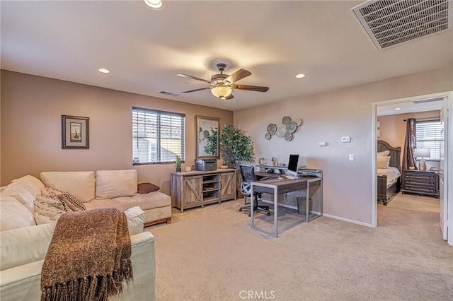 office featuring light colored carpet, recessed lighting, ceiling fan, and baseboards