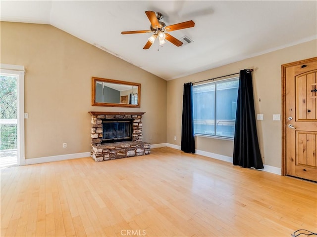 2690 Chaparral Ln, Paso Robles, CA 93446 - living room featuring ceiling fan, lofted ceiling, light wood-type flooring, a fireplace, and baseboards