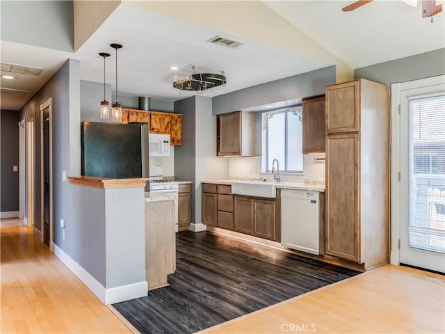 2690 Chaparral Ln, Paso Robles, CA 93446 - kitchen featuring white appliances, dark wood-style flooring, baseboards, a sink, and a ceiling fan