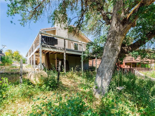 2690 Chaparral Ln, Paso Robles, CA 93446 - back of house featuring a wooden deck, fence, and stairs