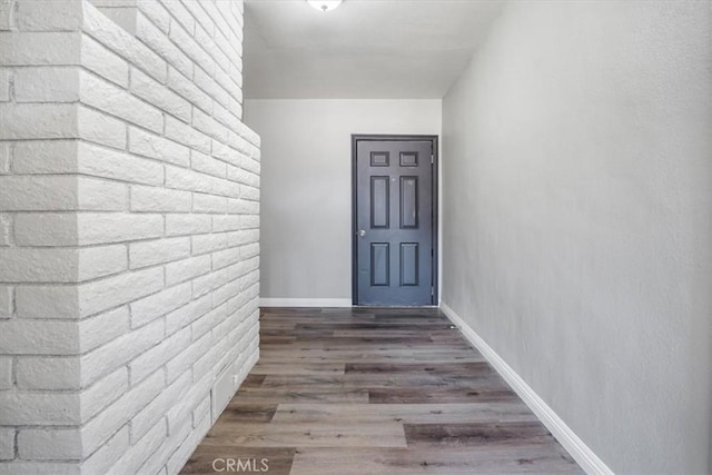 14351 Cronese Rd, Apple Valley, CA 92307 - hallway featuring wood finished floors and baseboards
