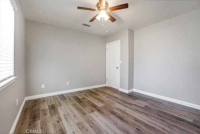 14351 Cronese Rd, Apple Valley, CA 92307 - empty room featuring ceiling fan, wood finished floors, and baseboards