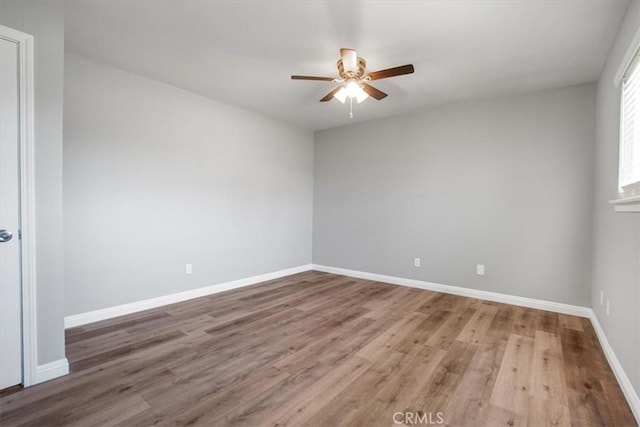 14351 Cronese Rd, Apple Valley, CA 92307 - spare room with ceiling fan, wood finished floors, and baseboards