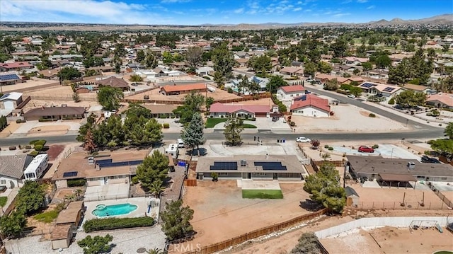 14351 Cronese Rd, Apple Valley, CA 92307 - aerial perspective of suburban area with a pool and a mountain backdrop