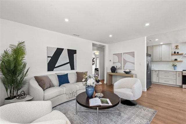 3163 W 170th St, Torrance, CA 90504 - living room with light wood finished floors, recessed lighting, and baseboards