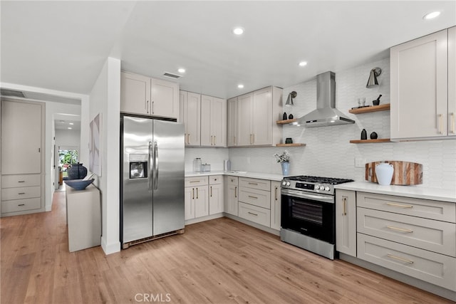 3163 W 170th St, Torrance, CA 90504 - kitchen with stainless steel appliances, wall chimney exhaust hood, open shelves, light countertops, and recessed lighting