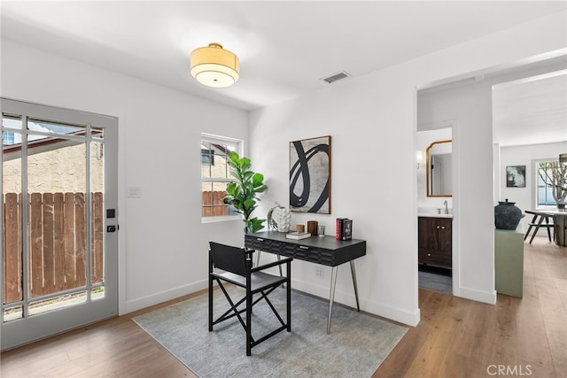 3163 W 170th St, Torrance, CA 90504 - office space featuring wood finished floors, baseboards, and a sink