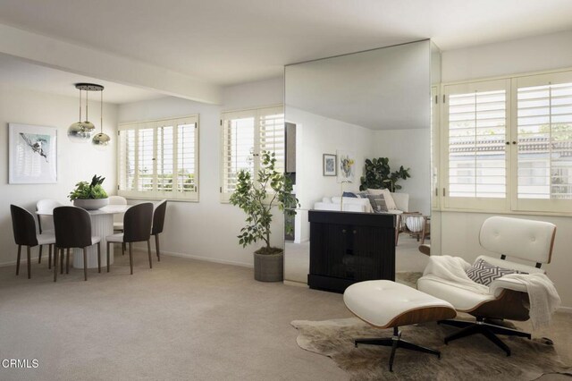 497 S El Molino Ave Unit 310, Pasadena, CA 91101 - sitting room with baseboards and carpet floors