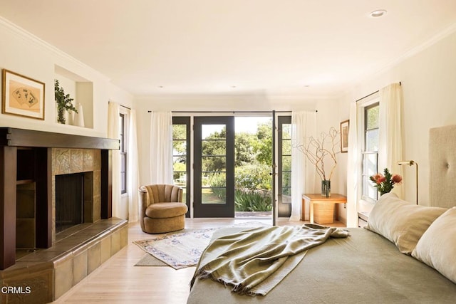1555 Scenic Dr, Pasadena, CA 91103 - living room with ornamental molding, healthy amount of natural light, wood finished floors, and a tiled fireplace