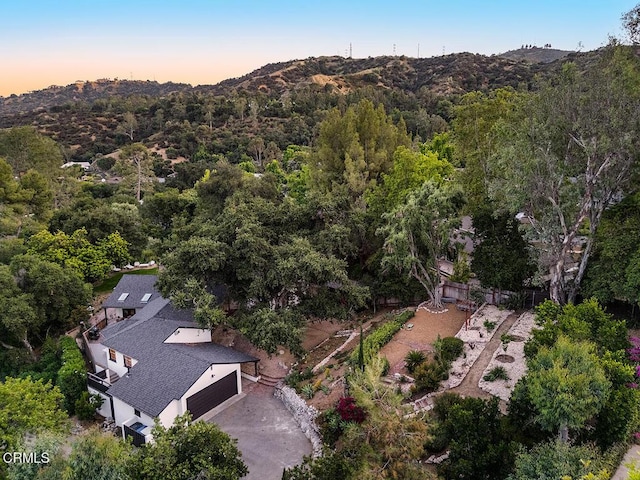1555 Scenic Dr, Pasadena, CA 91103 - drone / aerial view of a heavily wooded area and a mountain backdrop