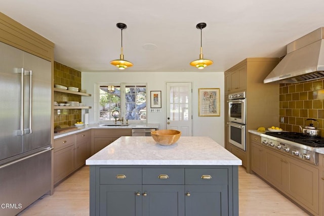 1555 Scenic Dr, Pasadena, CA 91103 - kitchen featuring appliances with stainless steel finishes, wall chimney range hood, backsplash, light wood-style floors, and open shelves