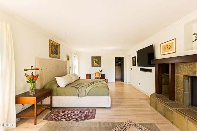 1555 Scenic Dr, Pasadena, CA 91103 - living room with light wood-style floors, crown molding, and a tiled fireplace