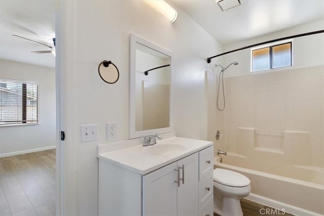 43324 45th St W, Lancaster, CA 93536 - bathroom featuring toilet, vanity, shower / washtub combination, and wood finished floors