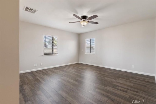 43324 45th St W, Lancaster, CA 93536 - unfurnished room with ceiling fan, dark wood finished floors, and baseboards