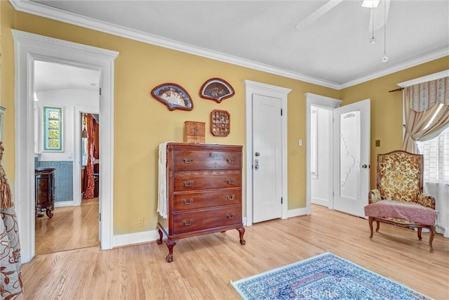 521 W Whiting Ave, Fullerton, CA 92832 - sitting room featuring light wood-type flooring, crown molding, and ceiling fan