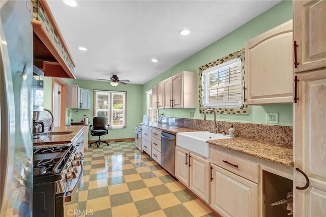 521 W Whiting Ave, Fullerton, CA 92832 - kitchen with stainless steel appliances, light flooring, healthy amount of natural light, a ceiling fan, and recessed lighting