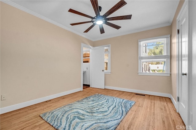 521 W Whiting Ave, Fullerton, CA 92832 - unfurnished bedroom featuring wood finished floors, crown molding, and a ceiling fan