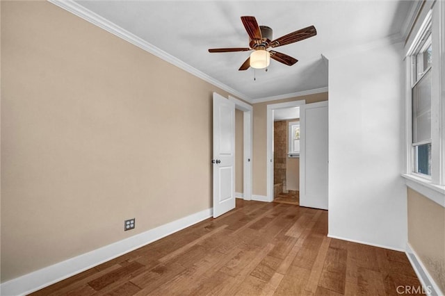 521 W Whiting Ave, Fullerton, CA 92832 - empty room with light wood-type flooring, ornamental molding, and a ceiling fan