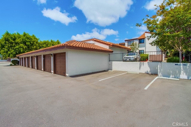 6970 Sandpiper Pl, Carlsbad, CA 92009 - garage with fence