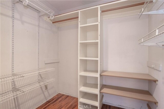 28083 Langside Ave, Canyon Country, CA 91351 - spacious closet with wood finished floors