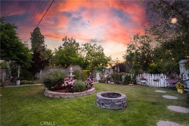 28083 Langside Ave, Canyon Country, CA 91351 - yard at dusk featuring a fire pit