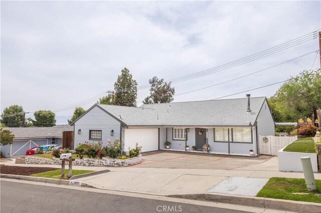 28083 Langside Ave, Canyon Country, CA 91351 - ranch-style home with a garage and driveway