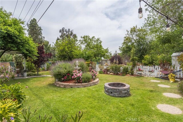 28083 Langside Ave, Canyon Country, CA 91351 - view of yard featuring a fire pit