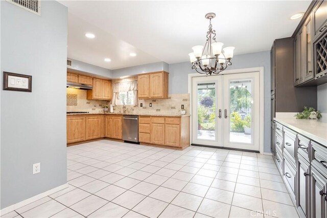 28083 Langside Ave, Canyon Country, CA 91351 - kitchen with stainless steel dishwasher, a chandelier, tasteful backsplash, light countertops, and recessed lighting