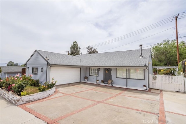 28083 Langside Ave, Canyon Country, CA 91351 - ranch-style house featuring a garage, driveway, and roof with shingles