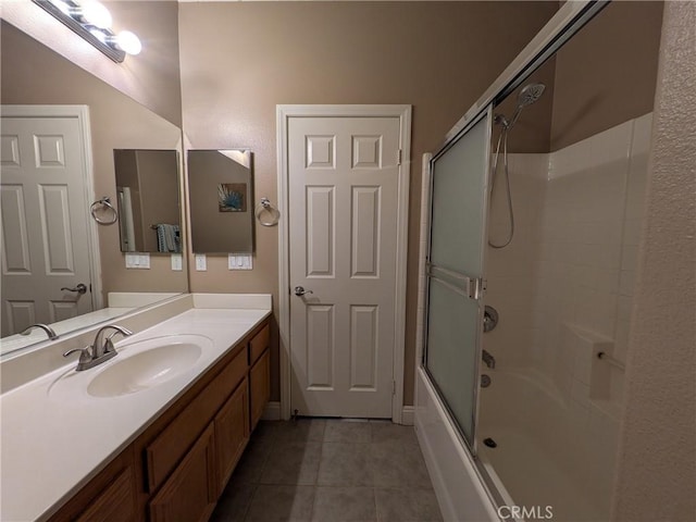 22132 Esaws Rd, Apple Valley, CA 92307 - bathroom with tile patterned flooring, combined bath / shower with glass door, and vanity