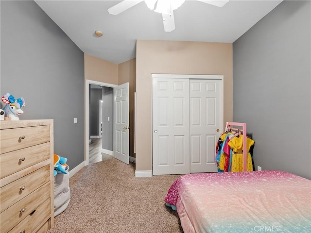 22132 Esaws Rd, Apple Valley, CA 92307 - carpeted bedroom featuring a closet, baseboards, and ceiling fan