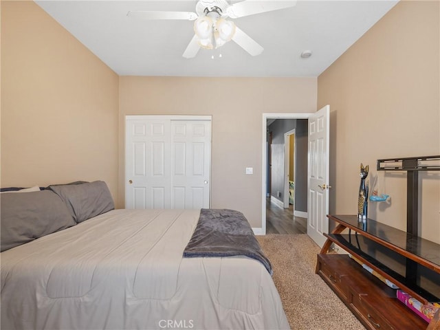 22132 Esaws Rd, Apple Valley, CA 92307 - bedroom with ceiling fan, a closet, baseboards, and carpet
