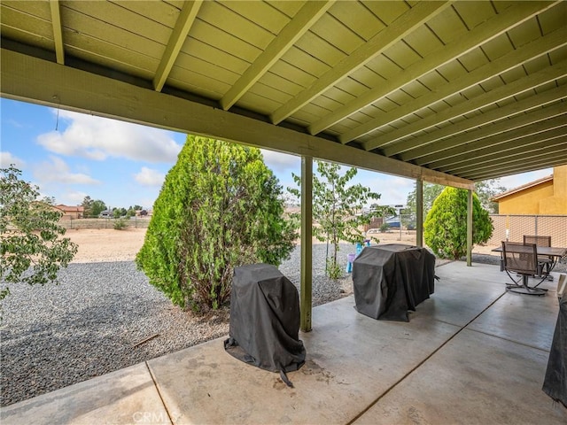 22132 Esaws Rd, Apple Valley, CA 92307 - fenced backyard featuring a patio area, grilling area, and outdoor dining space
