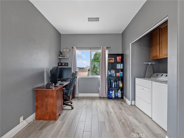 22132 Esaws Rd, Apple Valley, CA 92307 - office with independent washer and dryer, light wood-type flooring, and baseboards