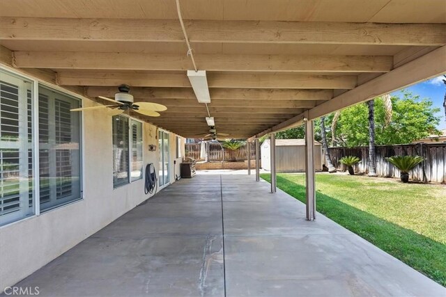 8433 Lindenhurst St, Riverside, CA 92508 - fenced backyard with a patio, a storage shed, and ceiling fan