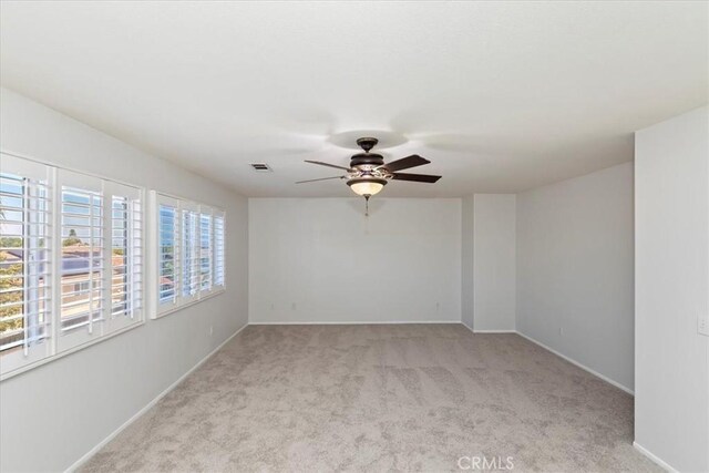 8433 Lindenhurst St, Riverside, CA 92508 - unfurnished room with light carpet and ceiling fan