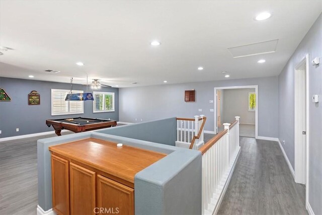 8433 Lindenhurst St, Riverside, CA 92508 - corridor with wood finished floors, an upstairs landing, and recessed lighting