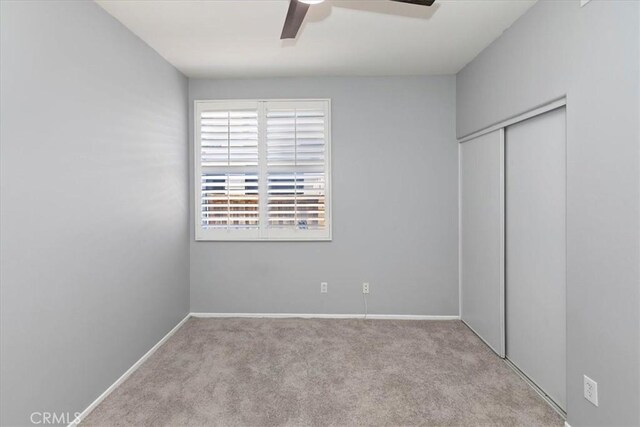 8433 Lindenhurst St, Riverside, CA 92508 - unfurnished bedroom with carpet floors, a closet, and ceiling fan