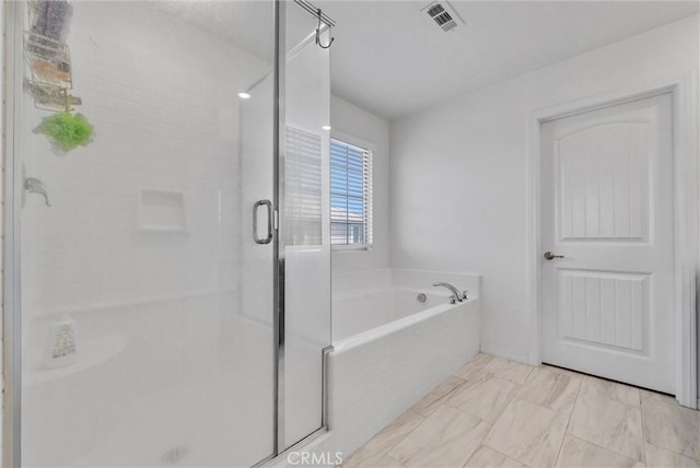 16548 Monteviejo St, Fontana, CA 92336 - full bathroom with a shower stall, a bath, and marble look tile flooring