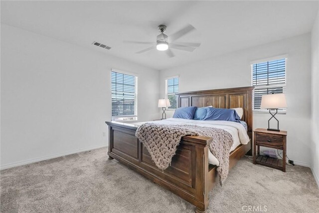 16548 Monteviejo St, Fontana, CA 92336 - bedroom featuring light carpet, baseboards, and ceiling fan