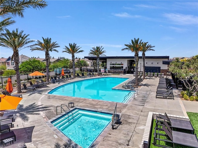 16548 Monteviejo St, Fontana, CA 92336 - community pool with a patio and a hot tub