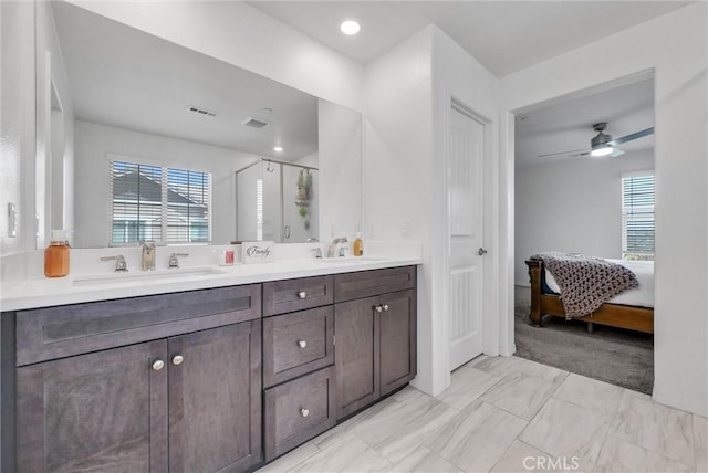 16548 Monteviejo St, Fontana, CA 92336 - full bath featuring connected bathroom, double vanity, a stall shower, and ceiling fan