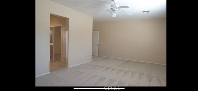 78379 Kistler Way, Palm Desert, CA 92211 - spare room with light colored carpet, a ceiling fan, and baseboards