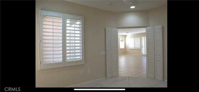 78379 Kistler Way, Palm Desert, CA 92211 - tiled empty room with ceiling fan and baseboards