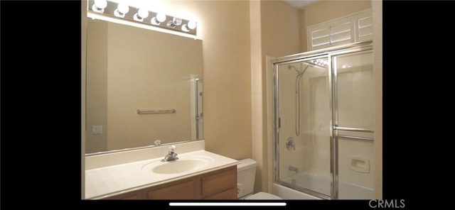 78379 Kistler Way, Palm Desert, CA 92211 - bathroom with toilet, bath / shower combo with glass door, and vanity