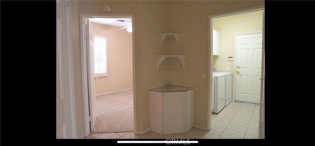 78379 Kistler Way, Palm Desert, CA 92211 - laundry area with washing machine and clothes dryer, light tile patterned flooring, baseboards, and a ceiling fan