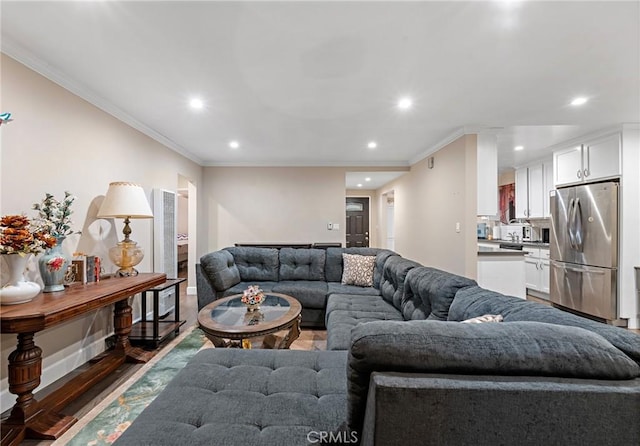 14725 Kornblum Ave, Hawthorne, CA 90250 - living room with recessed lighting, crown molding, wood finished floors, and baseboards