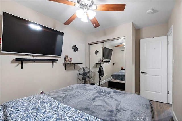 14725 Kornblum Ave, Hawthorne, CA 90250 - bedroom featuring wood finished floors, a closet, ceiling fan, and baseboards