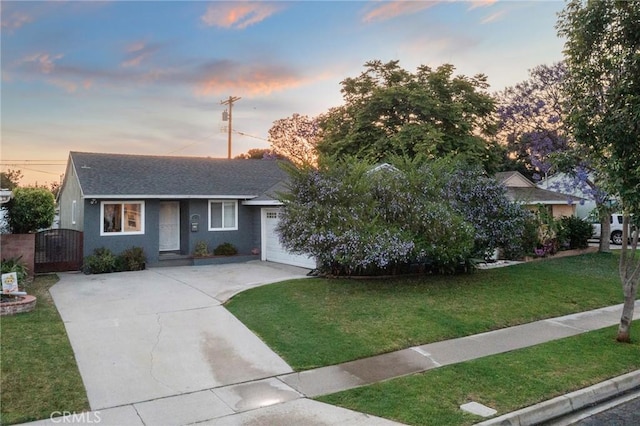 14725 Kornblum Ave, Hawthorne, CA 90250 - view of front of home with driveway, a garage, a front yard, a gate, and roof with shingles