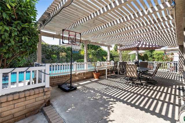 view of patio / terrace with outdoor dining area, an outdoor pool, a pergola, and fence